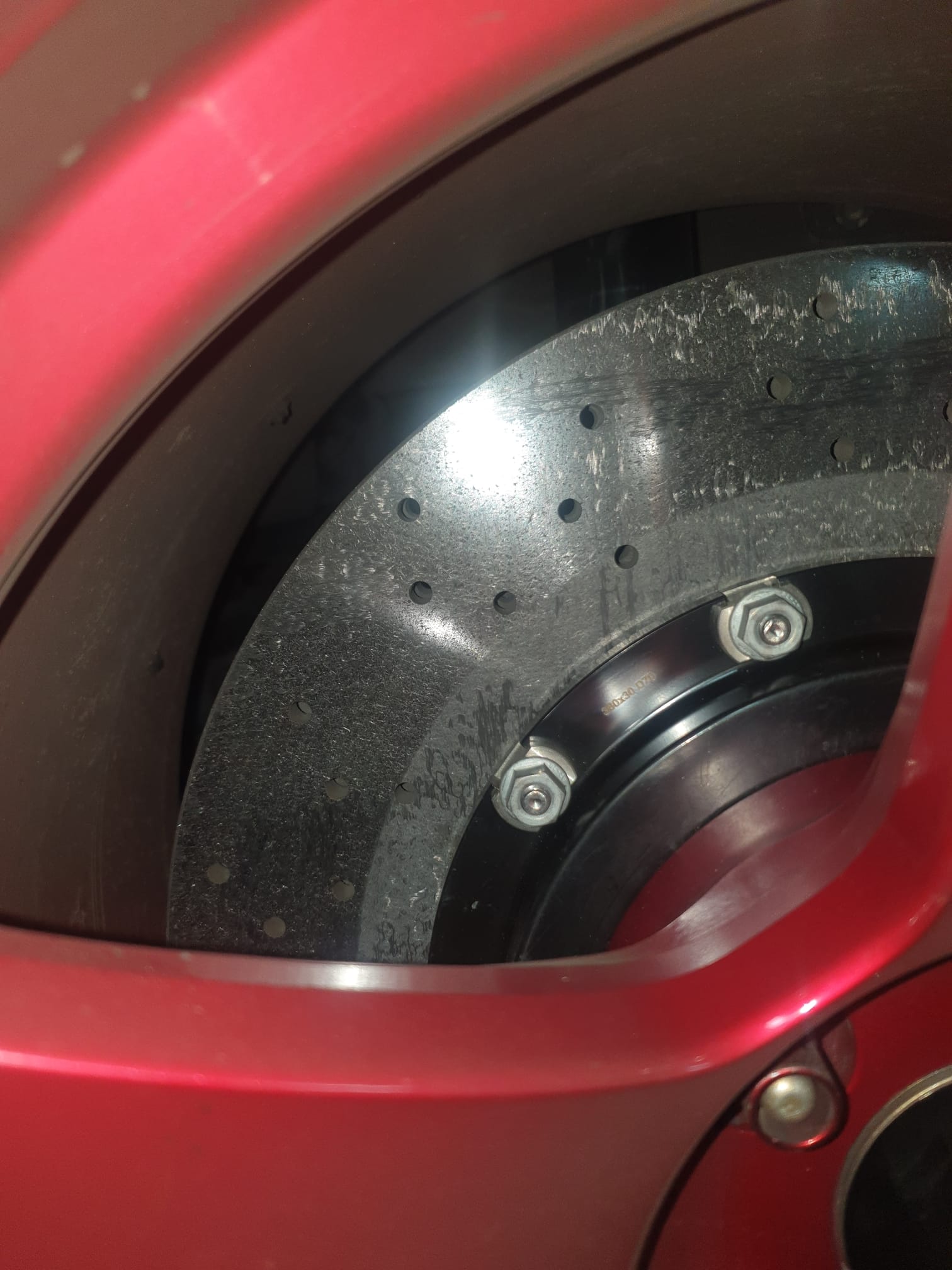 Macro view of a successfully bedded-in CTE Carbon Ceramic Brake Disc with a perfect metallic friction layer.