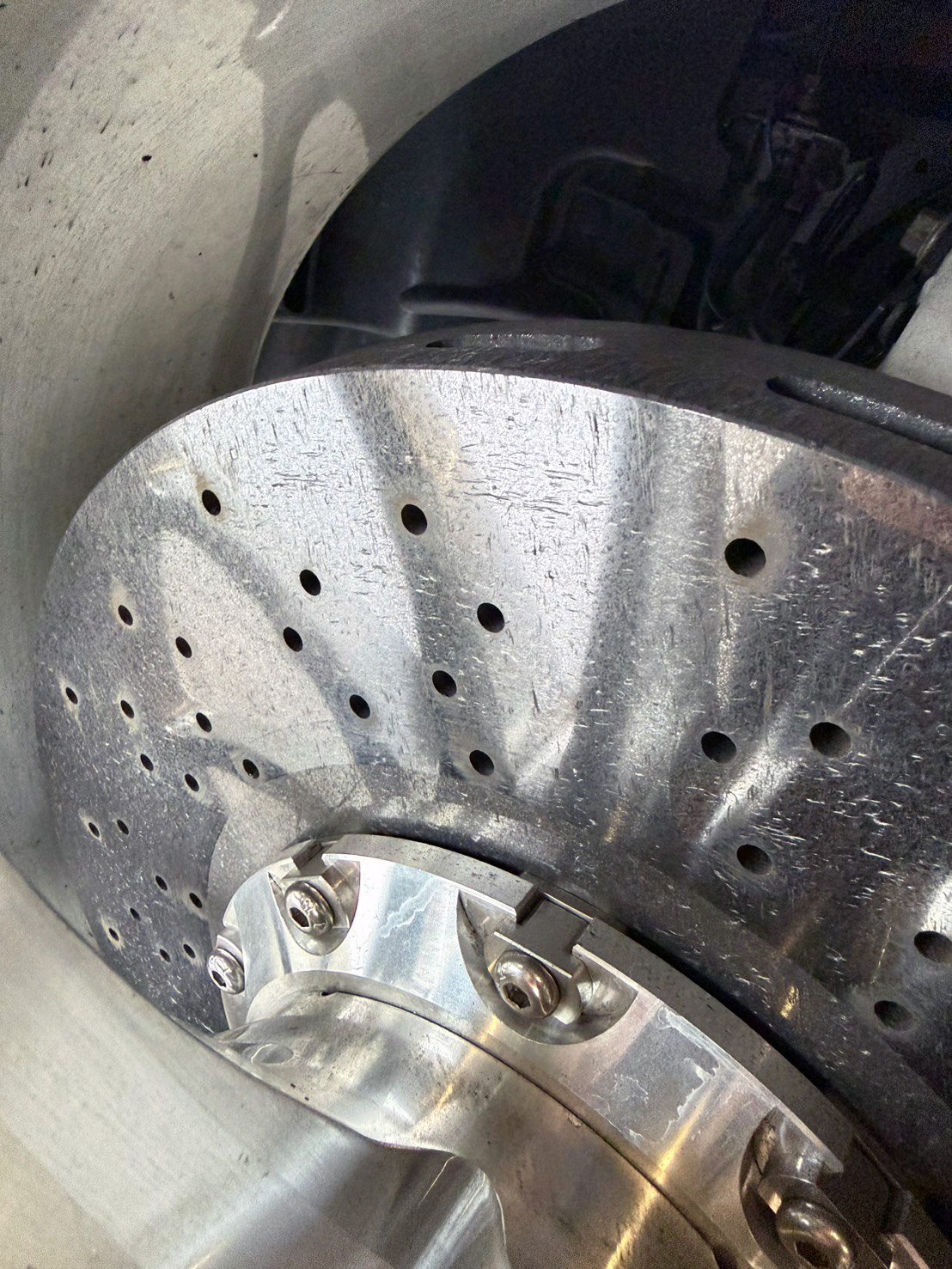 Close-up image of properly bedded carbon ceramic brake rotor surface